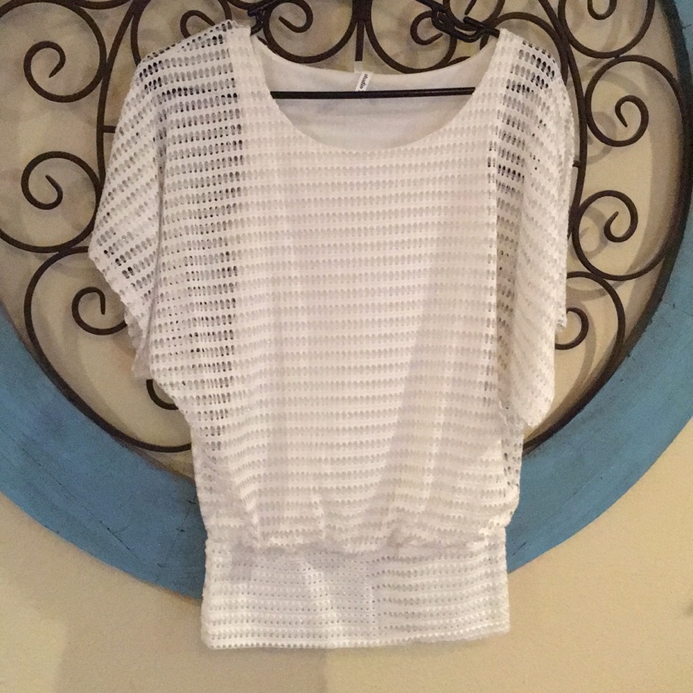 Lined sheer white and silver dolman top.